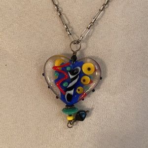 Glass heart pendant on 15 1/2 inch silver chain